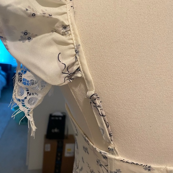 Elegant Cream Floral Ruffle Top - Picture 13 of 15